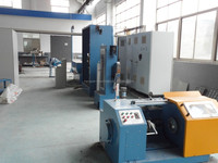 Machine à fabrication de câbles électriques, pour dessin de fils de cuivre intercalaires, avec bouilleur