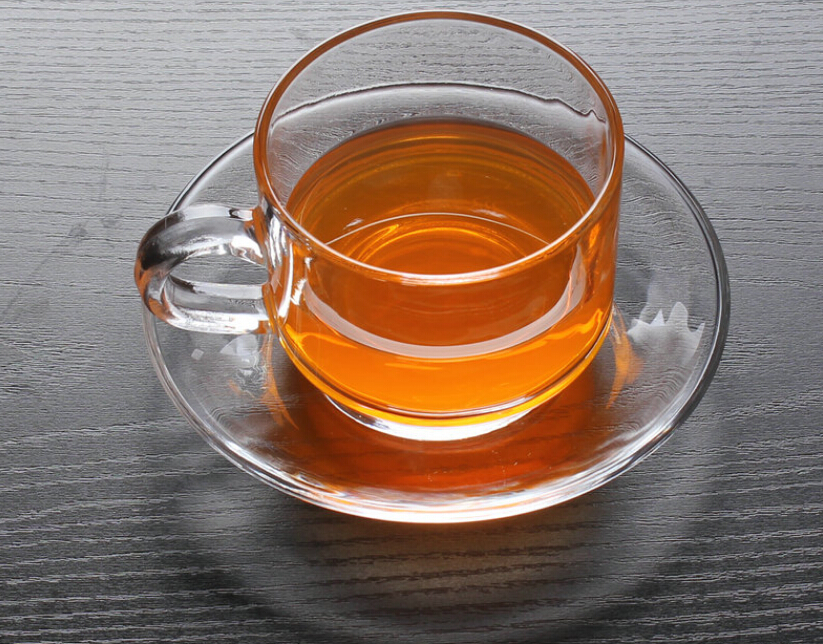 Glass coffee cup and saucer set