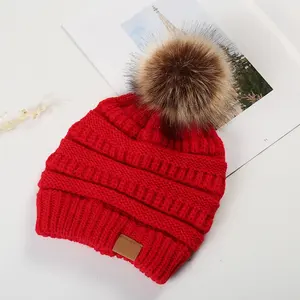 Hot Sale Custom Logo Gestrickte Strick mütze Hüte Winter Beanie Hut Mit Pom Pom