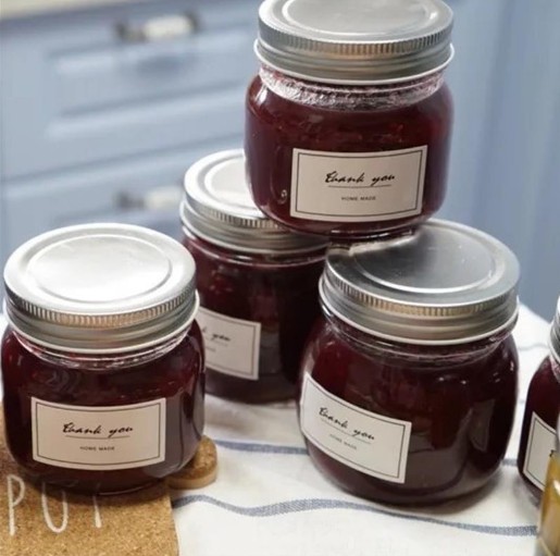 Round glass jar for honey jam with airtight lid