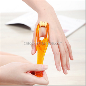 Mini masajeador de mano de plástico/masajeador de dedos de mano de plástico