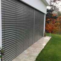 Stores à lamelles motorisées en aluminium sur mesure JSL Discount pour extérieur