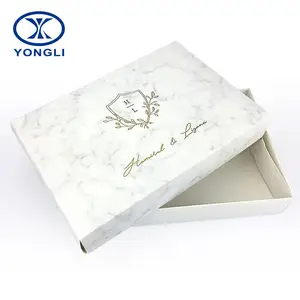 Confezione regalo in carta per abbigliamento con motivo in marmo di lusso con logo personalizzato