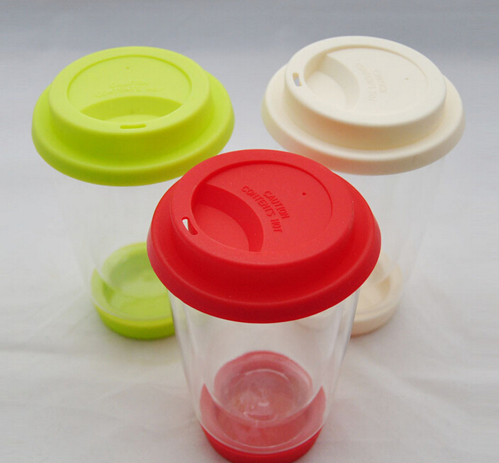 Double wall glass coffee cup with silicone base and lid