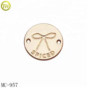 Round shaped custom engraved bowknot logo clothing gold tags sewing 2 holes metal label for bikini