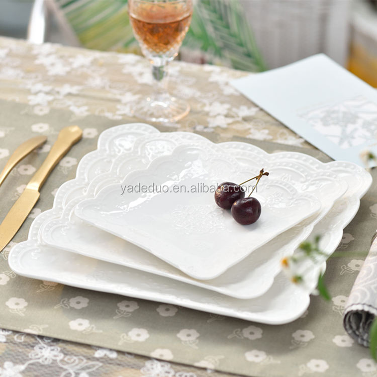 Plato de pastel blanco en relieve de cerámica plato de cena