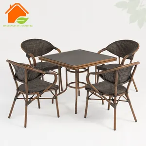 China Wholesale Cheap Price Synthetic Rattan 4pcs Garden Modern Dining Table Chair Set For Cafe Bistro Event Furniture