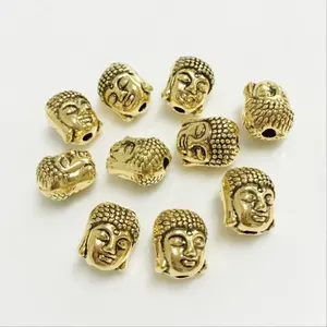 Bronzo antico argento placcato oro lega testa di Buddha perline accessori per gioielli con ciondoli adatti a bracciali a filo