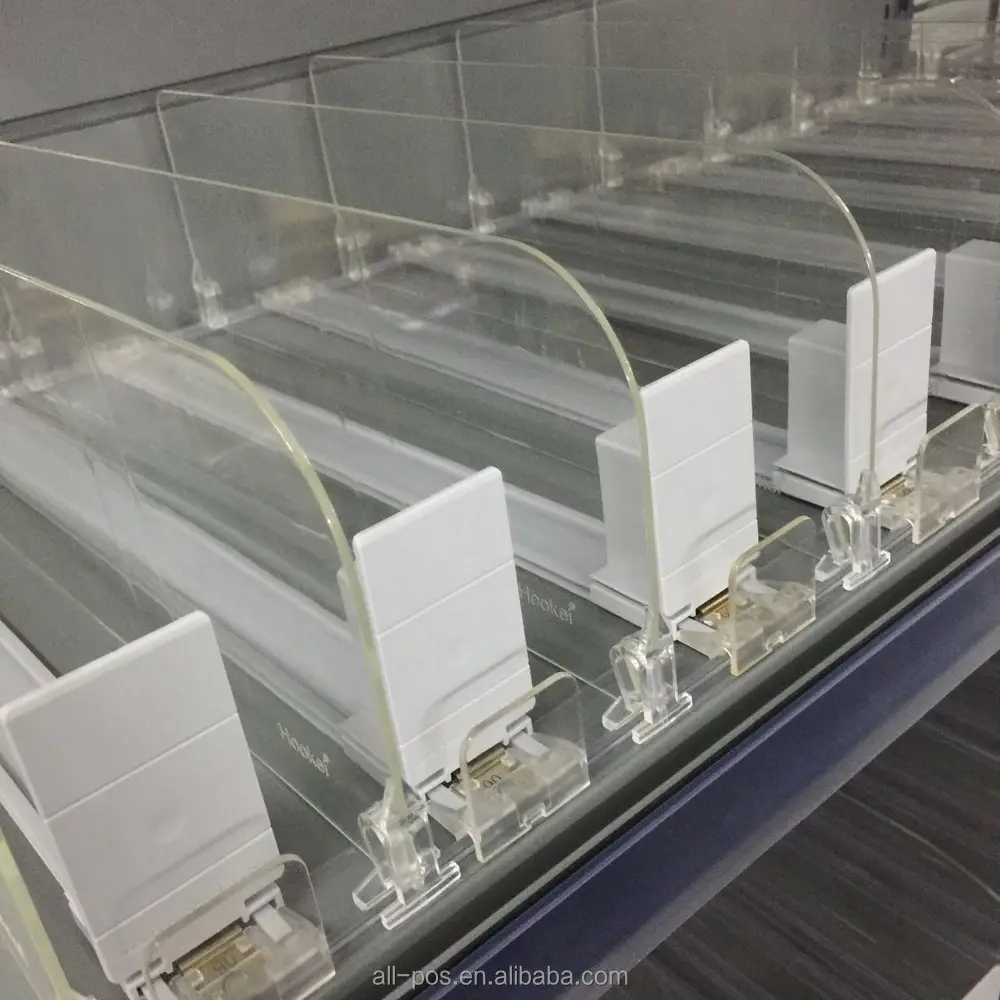 Sistema de empujador divisor de estante de plástico