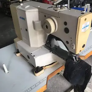 Máquina de costura com barra