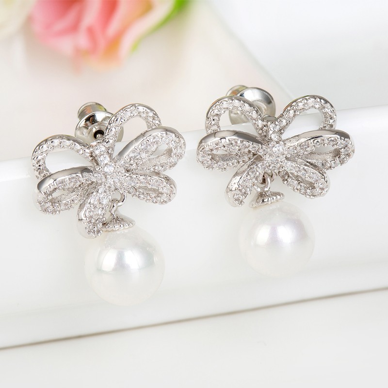 Le Parti de mariée de luxe de Teemi gros New Women lumineux CZ Micro Pave Réglage Avec Perle High End Stud Bow