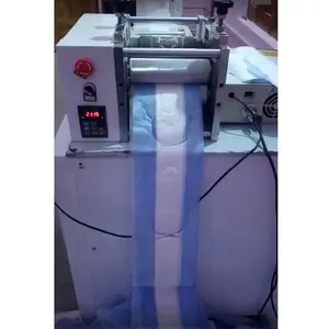 Máquina para hacer compresas sanitarias, automática
