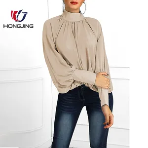 Женская блузка с длинным рукавом-фонариком, широкими манжетами и рюшами