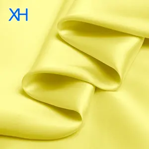 Hot Sale Yellow Silk Satin Fabric Ankara with Low Price by Xinhe Textiles