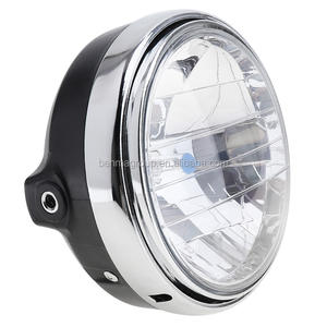 Faro Universale per Moto da 7 Pollici 35W con Lampadina Alogena Ambra per CB400 CB500 CB1300 <span class=keywords><strong>Hornet</strong></span> 250 600 <span class=keywords><strong>900</strong></span> - Product Image 1