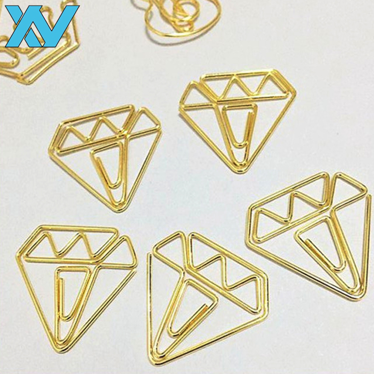 Золотистый зажим для бумаги в форме бриллианта