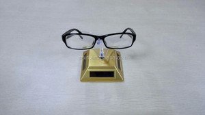 Eco-fashion Solar <strong>Rotating</strong> <strong>Display</strong> <strong>Stand</strong> for Glasses - Product Image 2