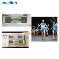 Etiqueta UHF RFID Dogbone Smartrac Wet Inlay 915mhz EPC Clase 1 Gen2 para Pegar en el Número de Corredor para Sistema de Cronometraje Deportivo de Ciclismo y Triatlón
