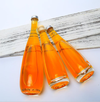 Fournisseur chinois Meilleur vendeur evian Bouteille d'eau minérale pour boisson Bouteille en verre d'eau gazeuse de source avec bouchon en alun 330ml