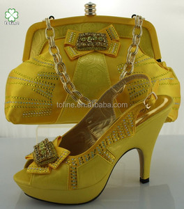 yellow shoes and matching bolsa