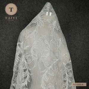 Alibaba Luxurious Feather Decoration China Import <strong>Fancy</strong> <strong>Lace</strong> Fabric for Wedding Dress - Product Image 1