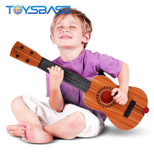 Guitarra de plástico Shantou para niños, <span class=keywords><strong>ukelele</strong></span> de juguete, venta al por mayor, fabricante OEM - Product Image 2