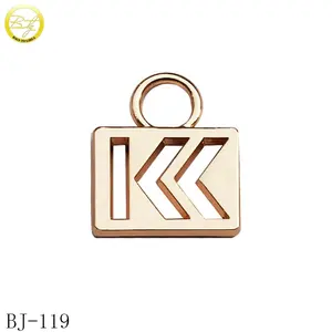 Logo de marque plaqué or bracelet en métal breloque étiquettes rondes en métal pour bijoux