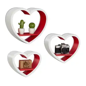 Productos de calidad de exportación de material de madera de forma de corazón moderno curva de pared flotante estante de libro - Product Image 1