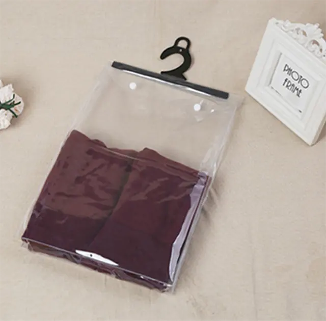 customized plastic package pvc bag with hanger and button closure for clothing
