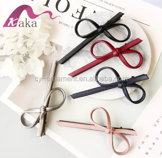 Accessoires de cheveux en gros simple style PU en cuir en forme d'arc épingles à cheveux