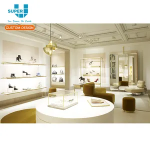 Großhandel Commercial Boutique Retail Store Regale Design Benutzer definierte Royal Glass Shop Armaturen Gold Steel Showcase
