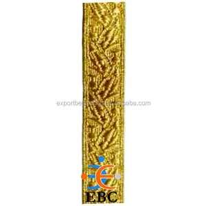 定制金色蕾丝编织物来样定做法国金色聚酯薄膜橡叶编织物蕾丝批发金属金色编织物，带格子图案