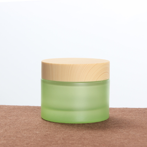 Bán buôn sang trọng 50g lọ kem thủy tinh với hạt gỗ nắp nhựa trắng mỹ phẩm chăm sóc da huyết thanh container - Product Image 1