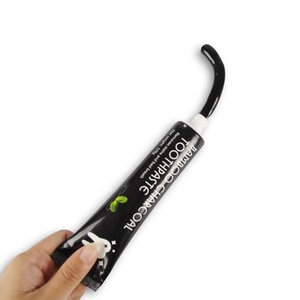 Dentifricio sbiancante al carbone attivo e <span class=keywords><strong>olio</strong></span> di <span class=keywords><strong>cocco</strong></span> da 105g - Product Image 2
