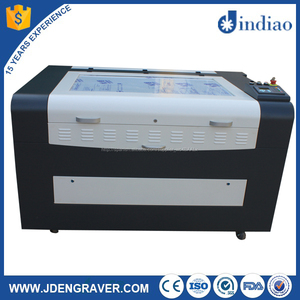 Madera de acrílico <span class=keywords><strong>mdf</strong></span> de la tela plástica <span class=keywords><strong>cnc</strong></span> de <span class=keywords><strong>corte</strong></span> por láser precio de la máquina - Product Image 1