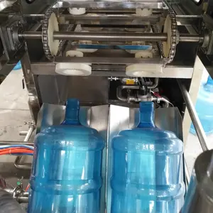 Mejor venta de tambores de 20 litros de agua cuantitativa máquina de llenado 5 galones de agua planta de embotellado en Zhangjiagang