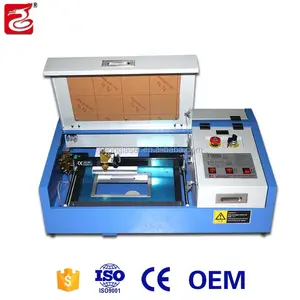 Günstige Mini CO2 Laser gra vierer Holz schneide maschine Stempel maschine 3020