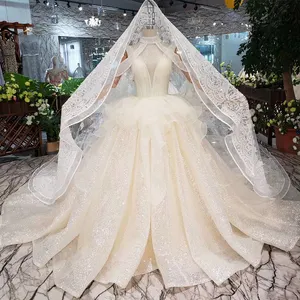 Hzl293 — robe de mariée sans manches, avec voile, dos nu, col en v, matériel brillant, tenue de mariage avec péplum