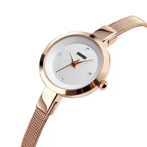 Venta al por mayor de alta calidad azul del reloj skmei señoras reloj tornillo pulsera reloj de lujo para mujer de oro rosa
