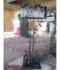 Free standing wrought iron post residential mailboxes