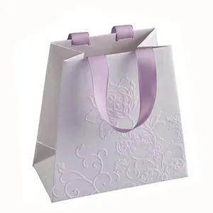 White custom logo silk ribbon handle embossed jewelry packaging gift paper bags