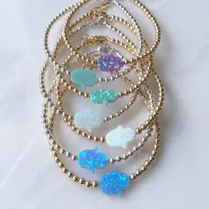 Ispirare all'ingrosso della fabbrica dei monili 2018 trendy dubai oro perline bracciale in acciaio Gioielli Con Blue Opal Hamsa del braccialetto di Fascino