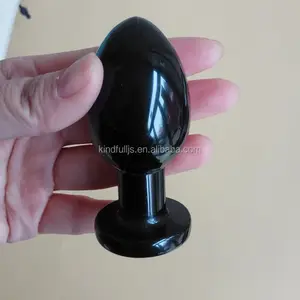 Obsidiana natural huevo de cristal enchufe trasero para masturbación femenina.