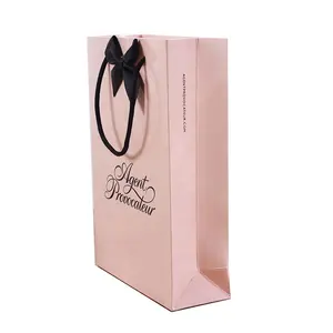 Новый дизайн, оптовая продажа, недорогой переработанный розовый бумажный пакет с ленточным галстуком