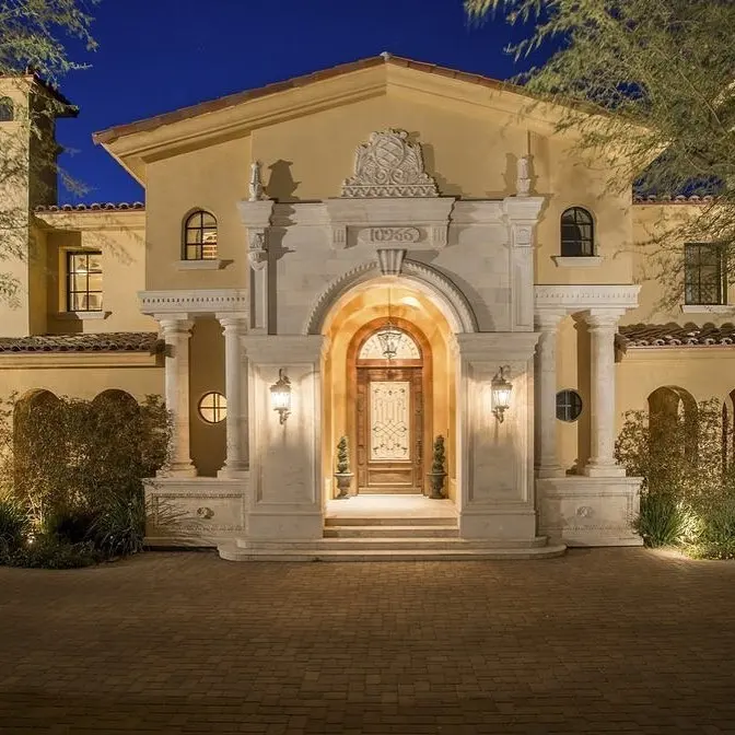 Custom designed exterior entrance with solid block of limestone