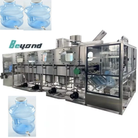 Ligne de remplissage, bouchage, rinçage et mise en bouteille d'eau potable entièrement automatique 600 BPH pour barils de 20 L à usage commercial