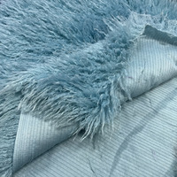 Fausse fourrure de mouton bouclée personnalisée bleu longue pile à la mode 100% polyester fausse fourrure de lama tissu pour vêtements