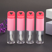 Nouveau style de tube de brillant à lèvres en plastique en forme de cœur avec grande brosse applicatrice, outil de séparation, emballage cosmétique, tube de gloss à lèvres