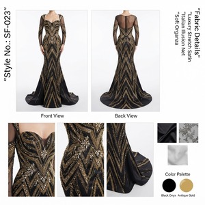Robe de soirée élégante en satin noir et or antique, longue jusqu'au sol, avec manches longues transparentes et broderies - Product Image 1