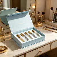 Boîte d'échantillons de parfum rigide magnétique à couvercle rabattable avec logo personnalisé et inserts en mousse EVA pour emballage cadeau de parfum